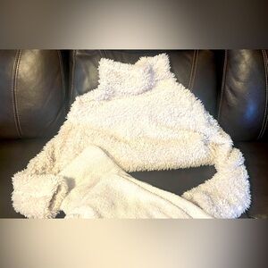 Two piece light grey, cozy two piece. Pants are polyester with spandex.